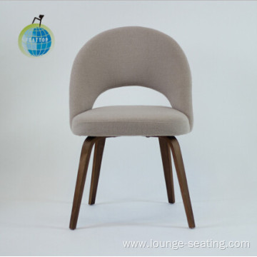 Upholstered chair with wood legs cafe dining style